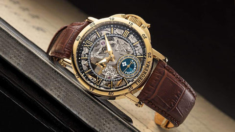 This is a watch from Tufina's Theorema collection, Casablanca GM-101-3 - a mechanical watch with luminescent hands, open front and back composition, real brown leather band and a stainless steel case with 5 micron gold plating.