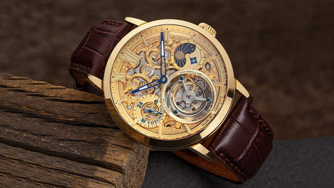 This is a watch from Tufina's Theorema collection, Zurich Tourbillon GM-901-2 - a mechanical multi-function tourbillon with a skeleton dial, dual-time function, sun and moon phase compilation and real leather band.