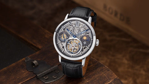 Tufina Theorema Zurich Tourbillon GM-901-1, mechanical tourbillon watch for men, GMT tourbillon with a skeleton dial, silver case, skeletonized hands, black leather band and sun and moon phase indicator