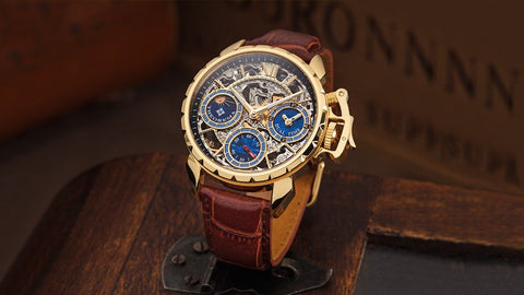 Tufina Theorema Oman, 5 micron gold plated watch for men with a mechanical movement, skeleton dial, two-colored white and gold hands and a brown leather band