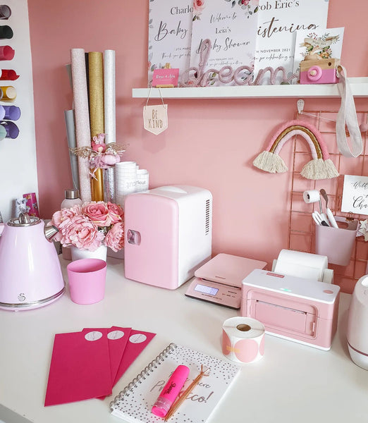 MUNBYN pink thermal label printer on the desk