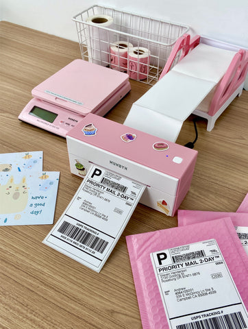 Create shipping labels with MUNBYN pink Bluetooth wireless thermal label printer.