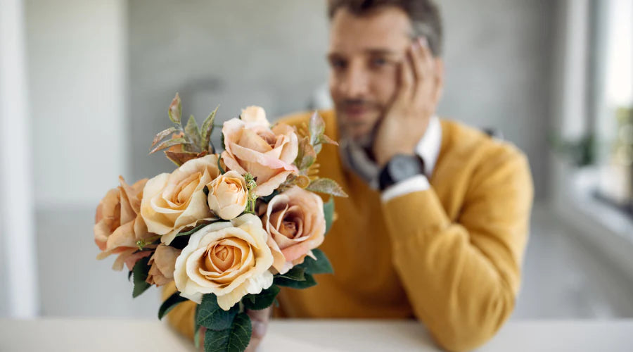 man with roses