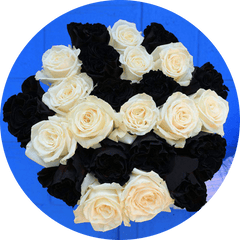 a bouquet of black and white roses