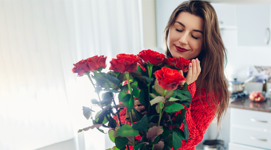 smiling woman with flowers