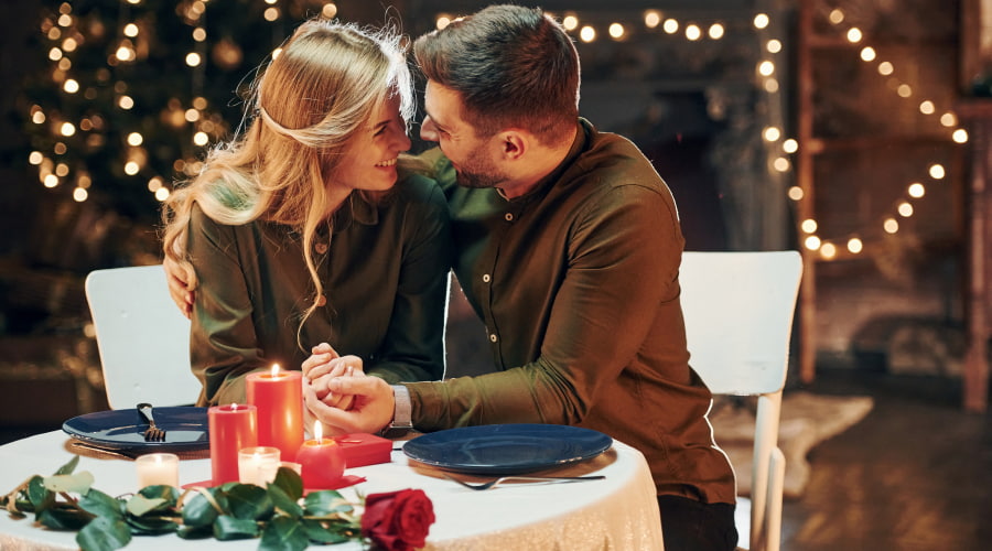 Couple enjoying a romantic candlelit dinner