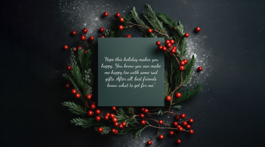 holiday card surrounded by red berries and pine branches on a dark surface