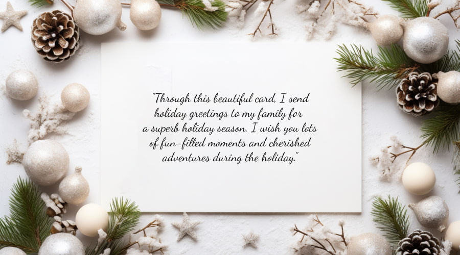 card with a holiday message amidst white Christmas decorations