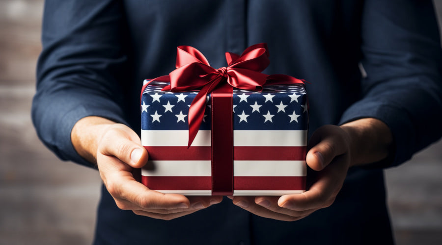 Person holding American flag gift box