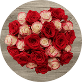 Vibrant red roses arrangement on wooden background