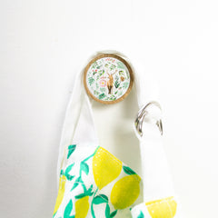 woodland print wall hook hanging an apron