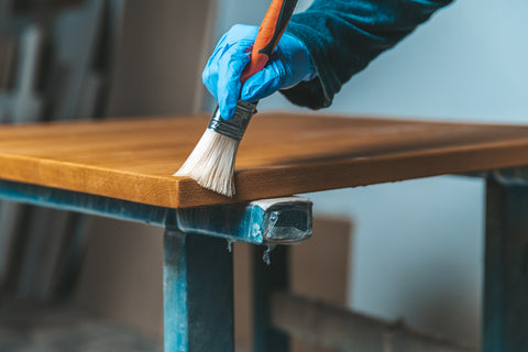 using quality brushes when painting furniture