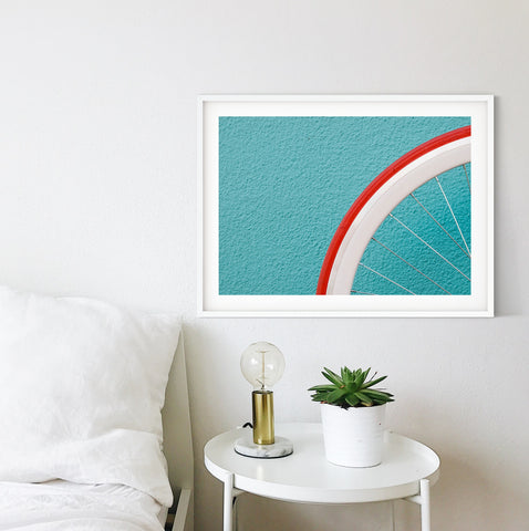 framed wheel print in a minimalist setting