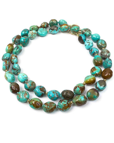 Egg-shaped natural nuggets with mixed blue, green, & brown colors hand-knotted into a 33 inch necklace.