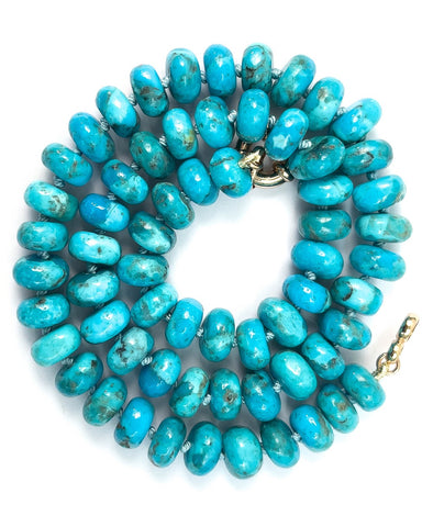 Bright blue Kingman turquoise rondelle shaped stones hand-knotted into a single strand 16.5 inch necklace.