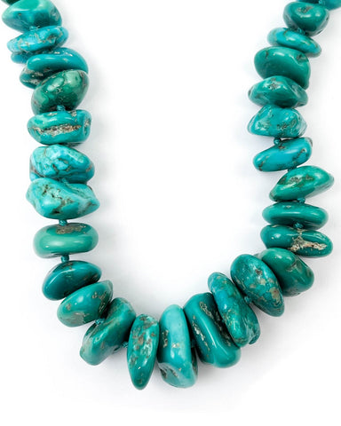 Large green-blue sleeping beauty turquoise nuggets hand-knotted into a single strand statement necklace.
