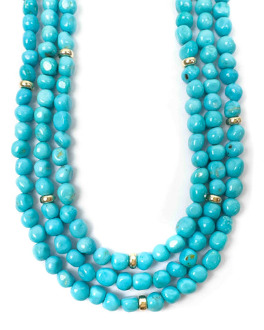 Three strands of sleeping beauty turquoise with randomly placed 14k gold beads 