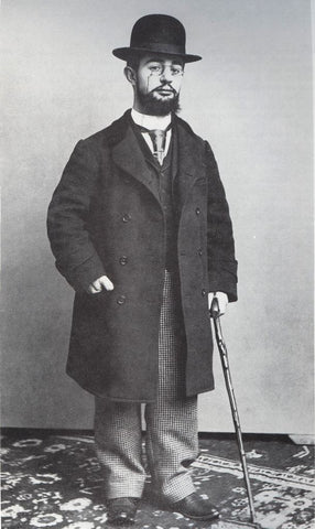 Photograph of Henri de Toulouse-Lautrec - standing with his cane and bowler hat
