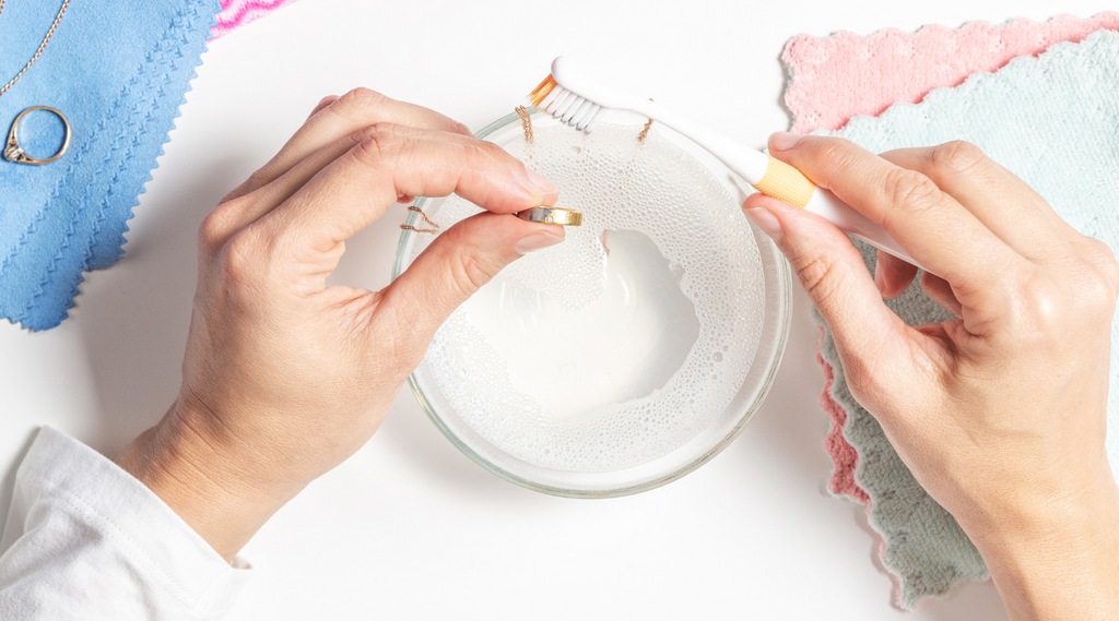 cleaning gold filled jewelry with soapy water and toothbrush