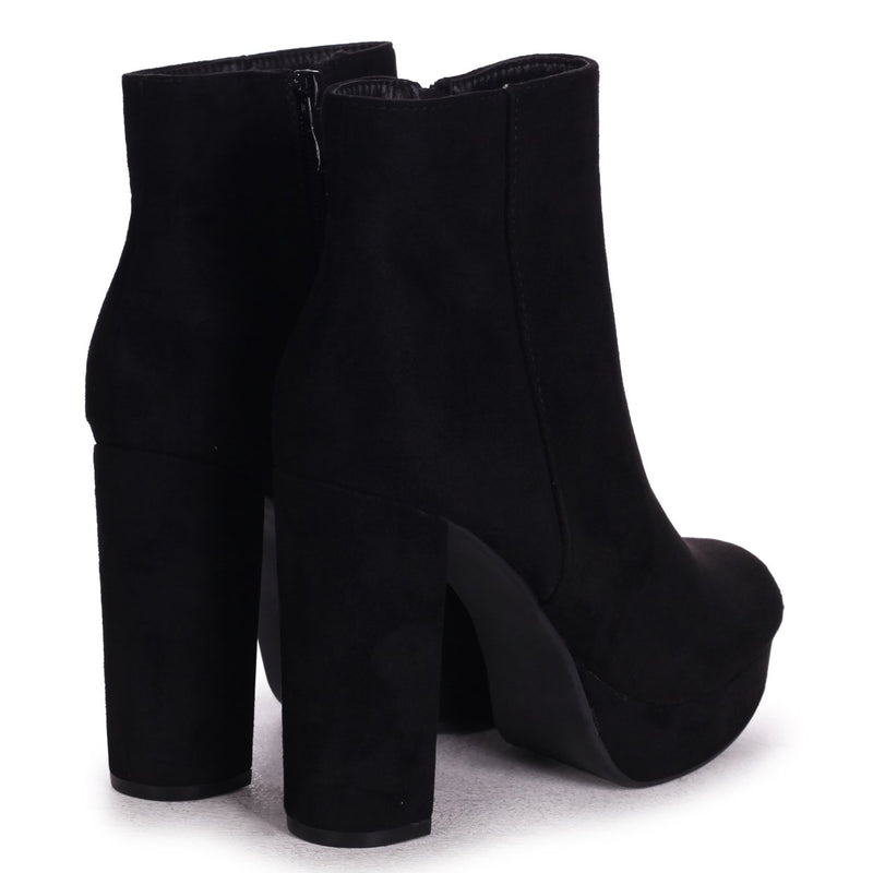 black platform heeled ankle boots