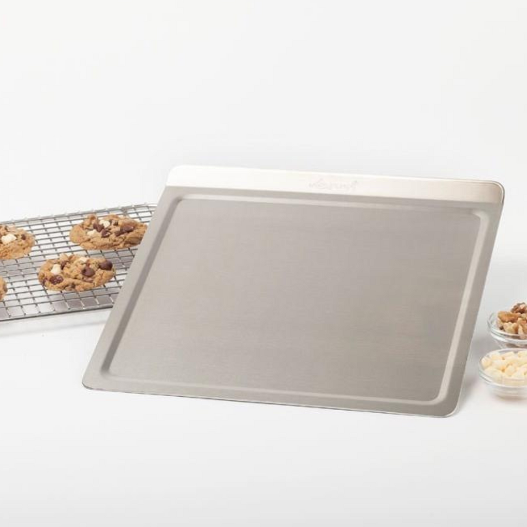 https://cdn.shopify.com/s/files/1/2656/4112/products/Buy-Me-Once-Stainless-Steel-Medium-Cookie-Sheet_1024x1024.png?v=1668170891