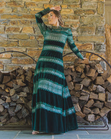  Woman wearing modest hunter green velvet and lace gown 