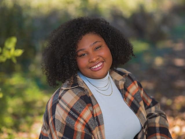 plus size black woman smiling