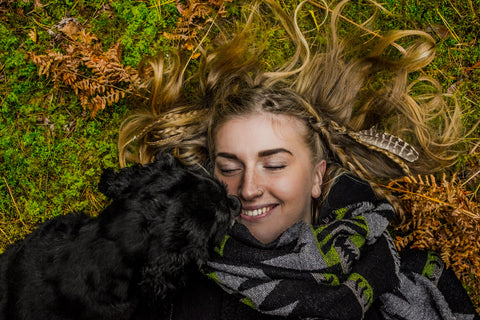 Girl with black dog