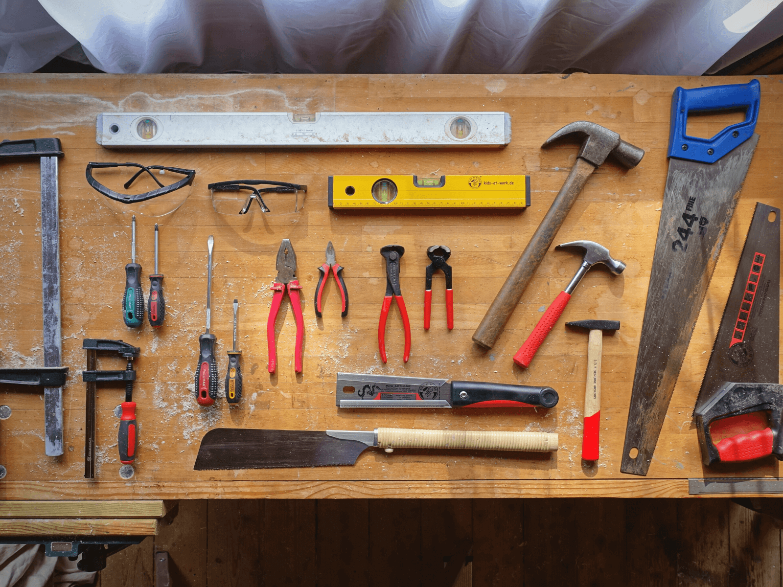 A size comparison: Kids at Work tools with regular adult-sized tools