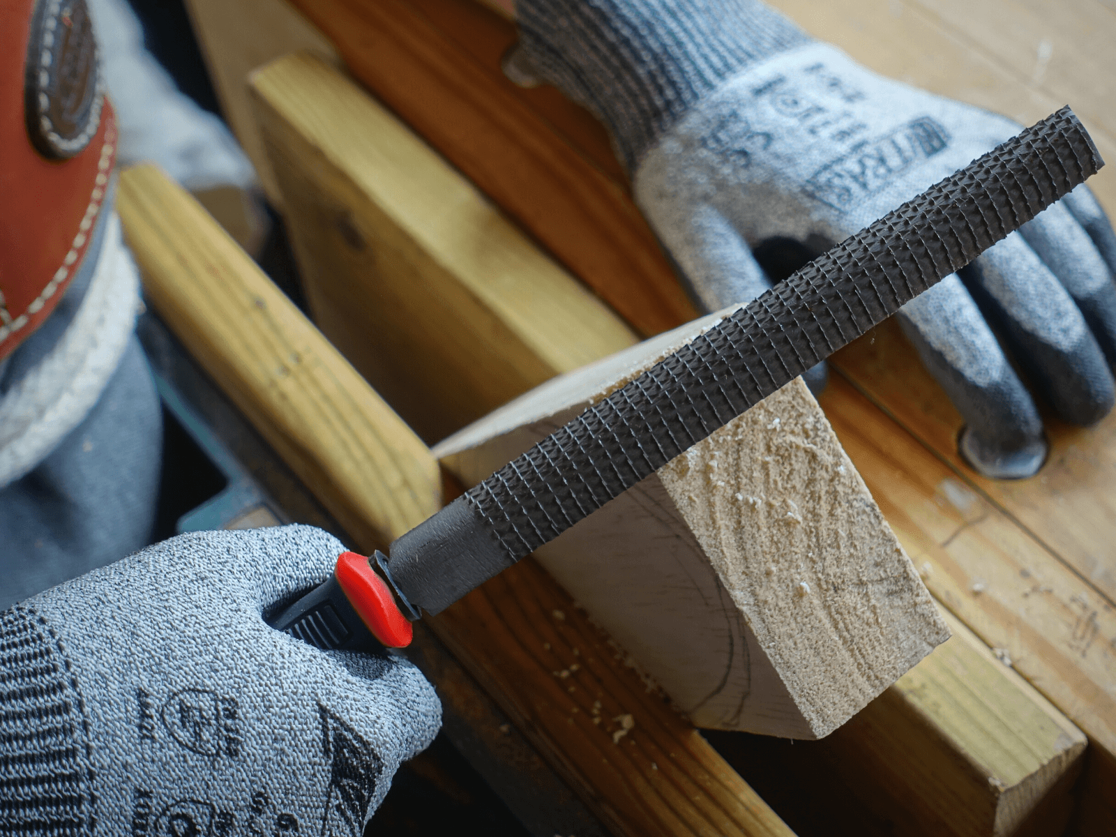Using a rasp or file, begin to shape the wood.