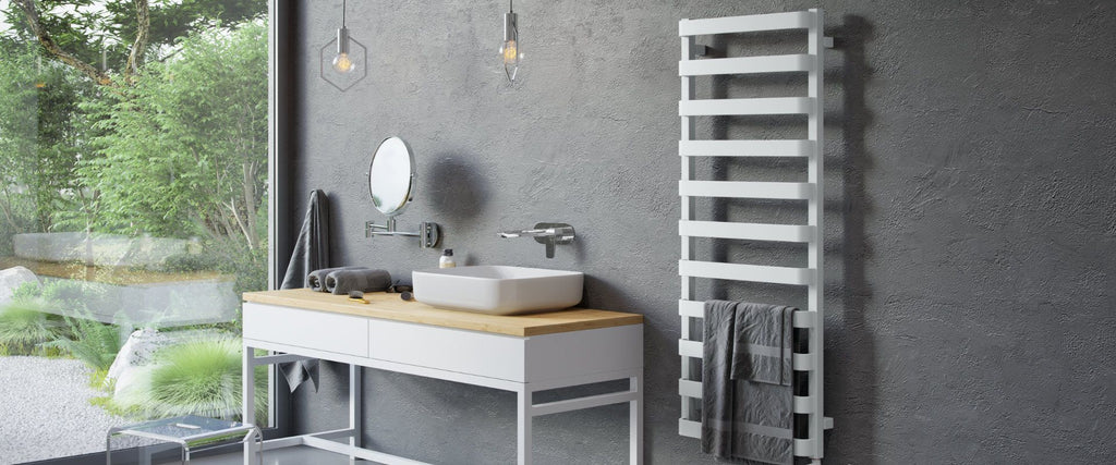 white towel rail radiator in dark bathroom