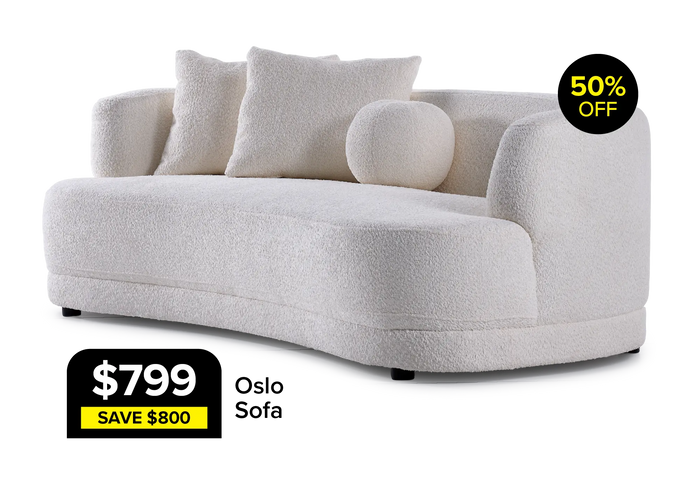 White bouclé curved sofa for $799, 50% off, saving $800.