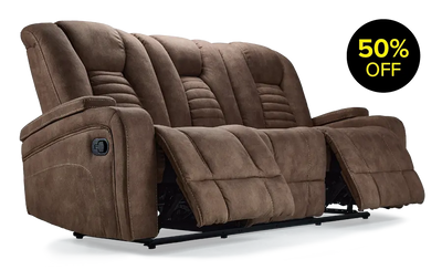 A brown reclining sofa with 50% off tag.