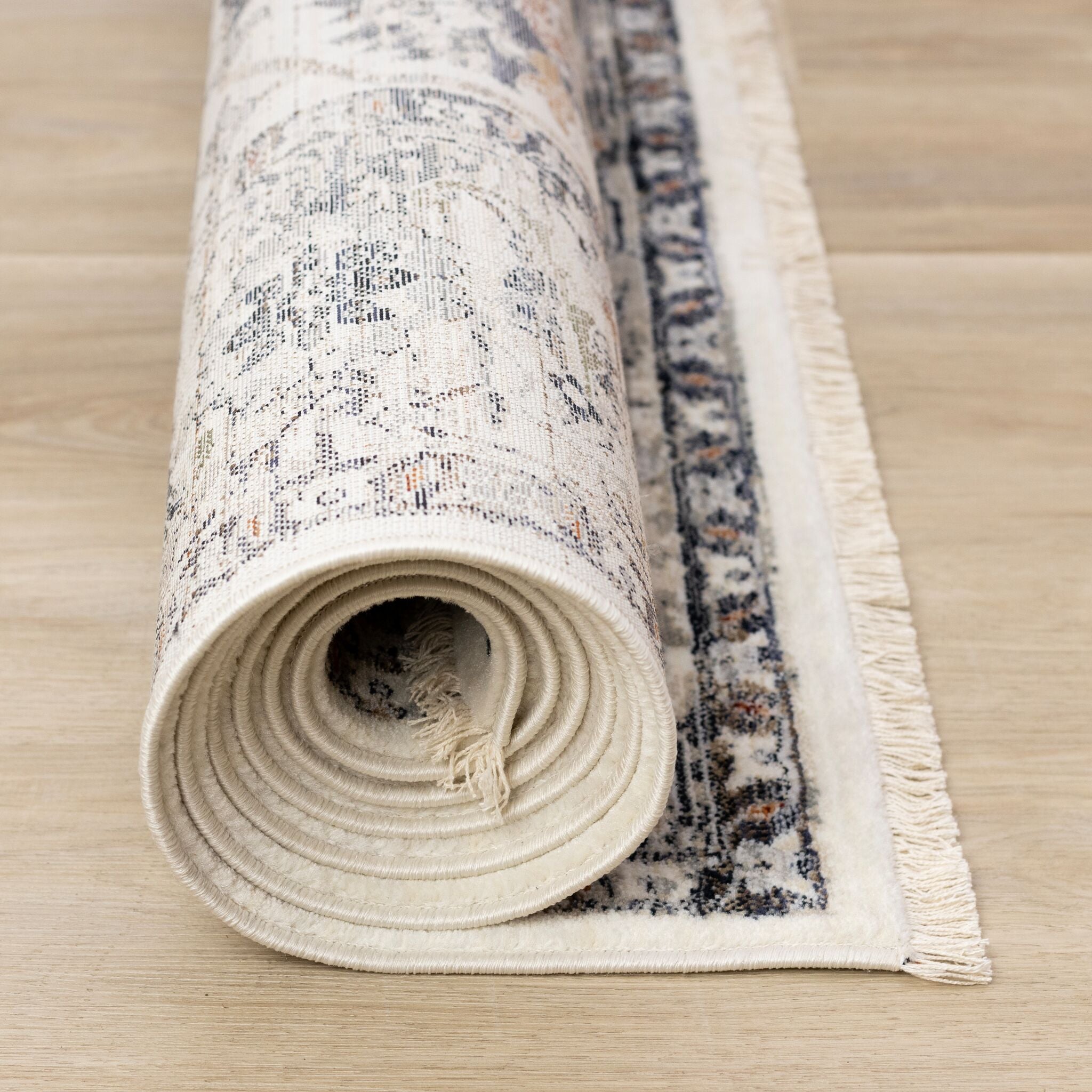 Exquisite 5'3" x 7'7" Area Rug with Intricate Border for a Serene Ambiance