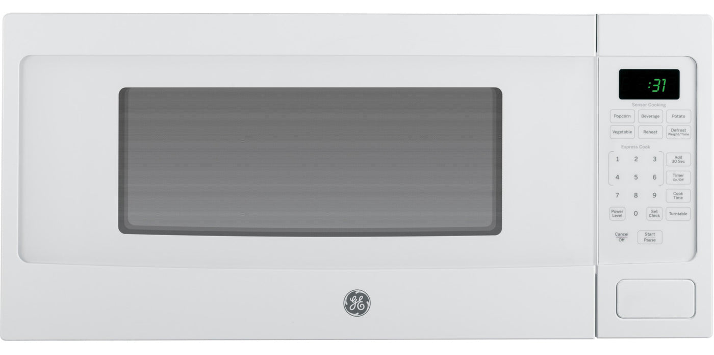 Ge Profile White Spacemaker Countertop Microwave 1 1 Cu Ft