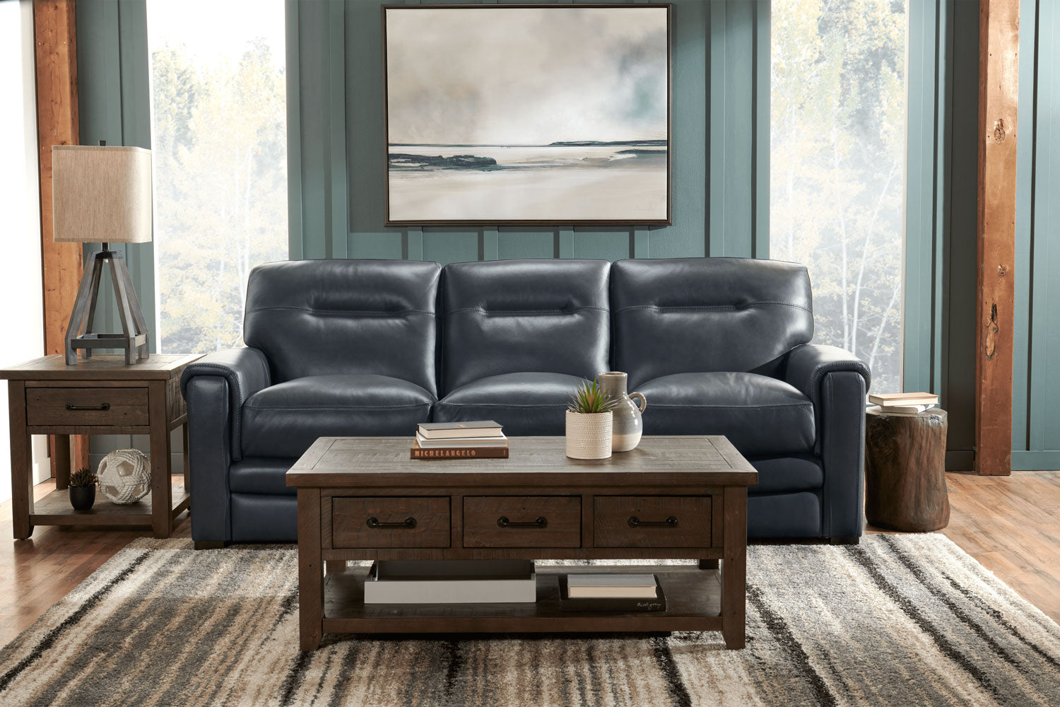 Cindy Crawford leather sofa, loveseat, and chair collection in living room