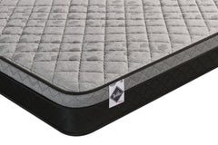 Matelas ferme dans une boîte de DreamCloud pour lit double