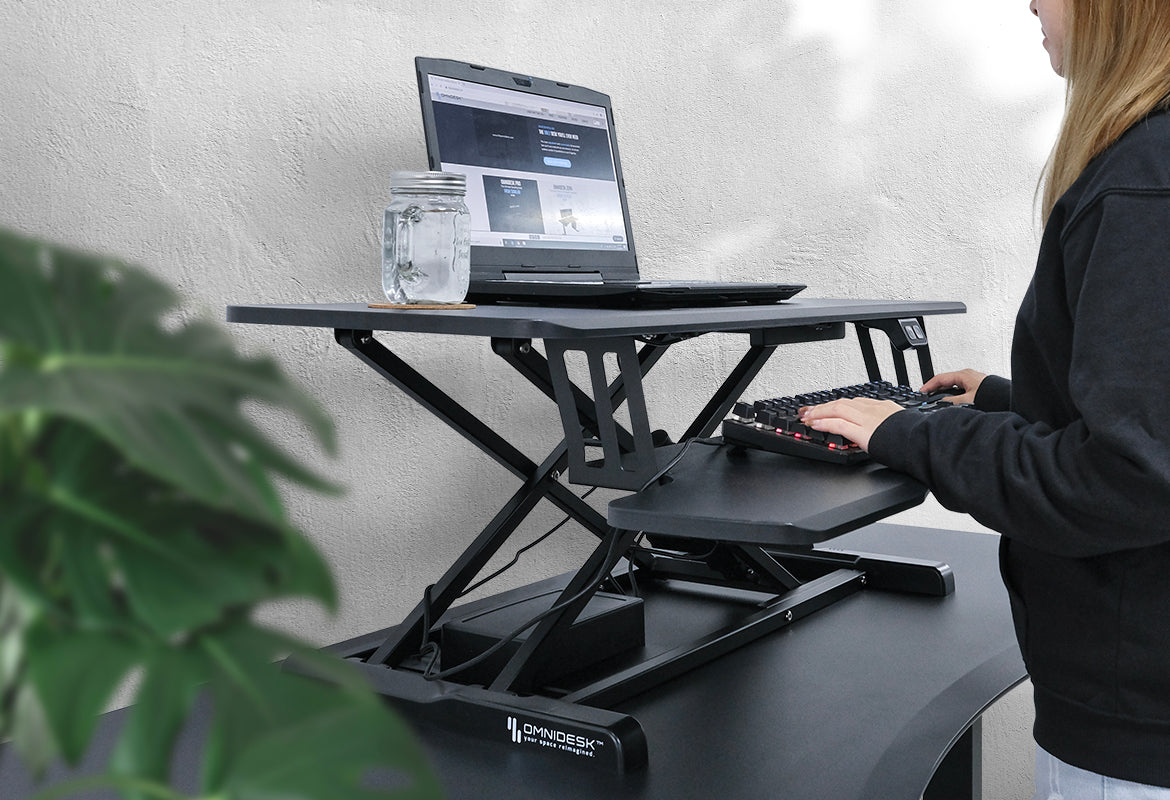 Ergonomic desk clearance for laptop