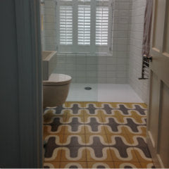 Retro design encaustic tile bathroom floor