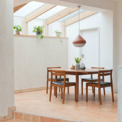 Natural terracotta tiles on a dining room floor