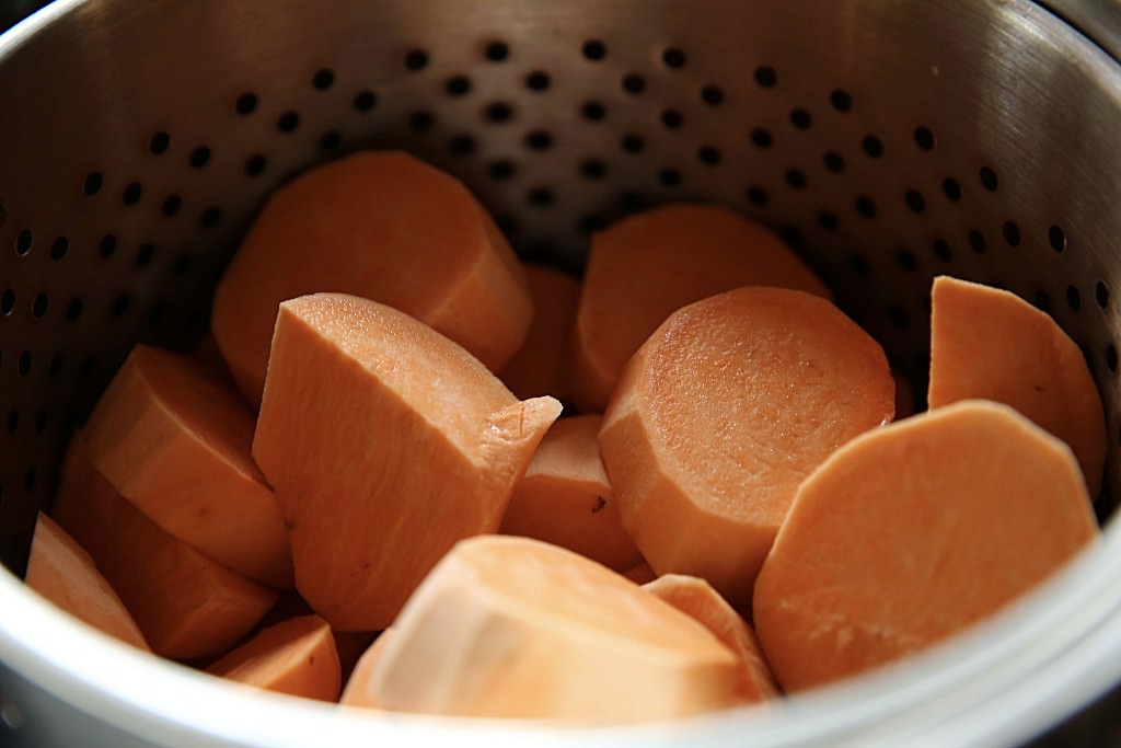 BoilingSweet potatoes for casserole baked in the Fontana wood-burning oven 