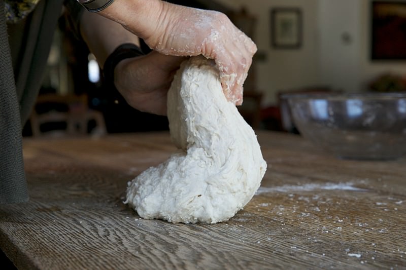 Knead dough for bread baked in the Fontana wood-fired oven