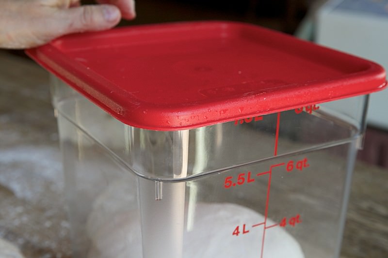 Place a cap on the container for bread baked in the Fontana wood-burning oven