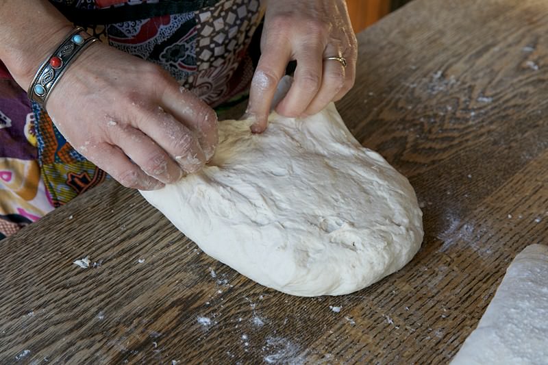 Shape dough for bread baked in the Fontana wood-fired oven