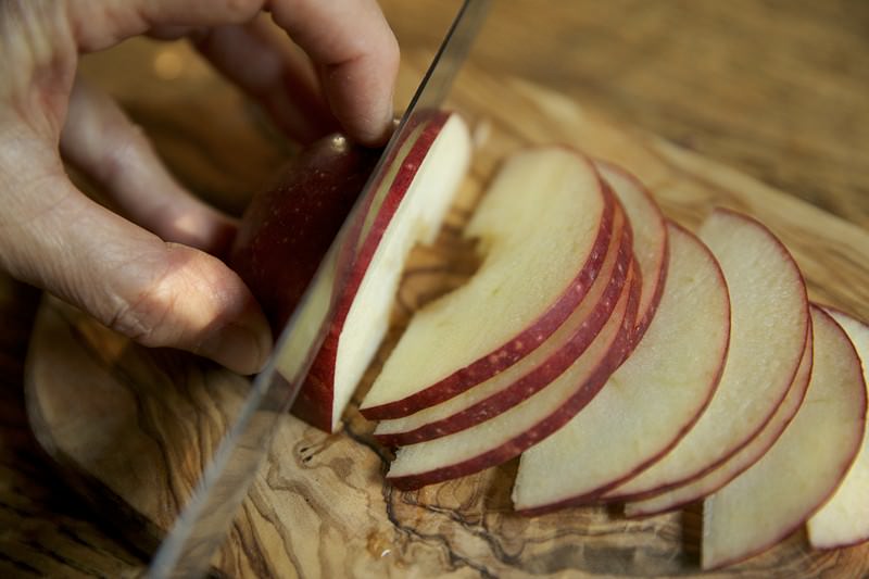 Slice each half into very thing slices