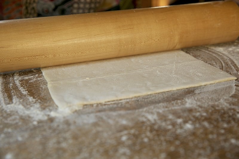 With a rolling pin stretch pastry gently, but firmly, always rolling away from you