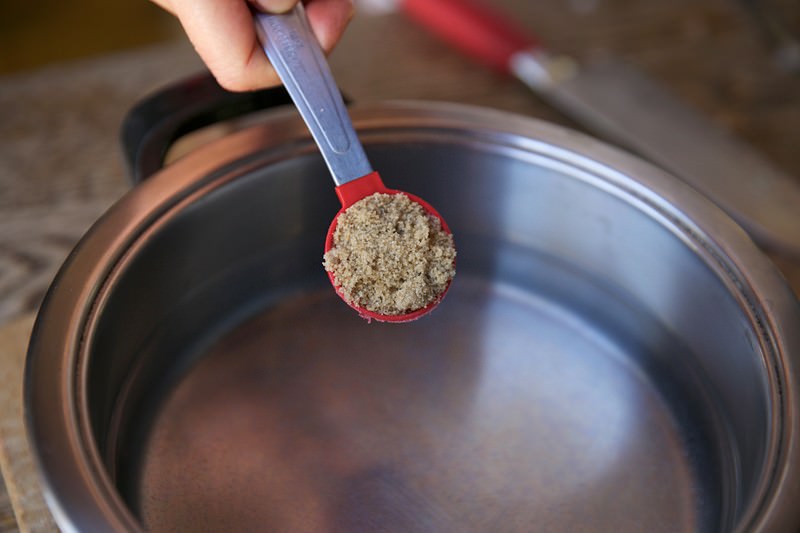 Brown sugar placed in brine for turkey to be baked in Fontana wood-fired oven 