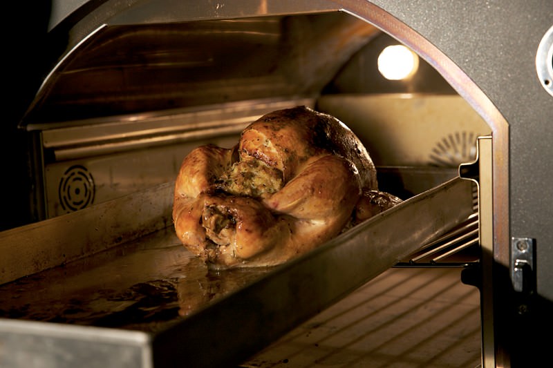 Pulling the turkey in the Fontana brick oven 