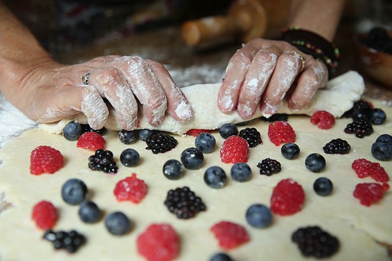 Begin to fold the dough as if making cinnamon rolls.