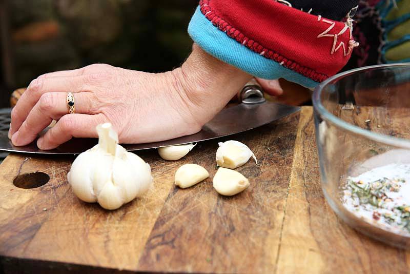 use a knife to gently crush the cloves